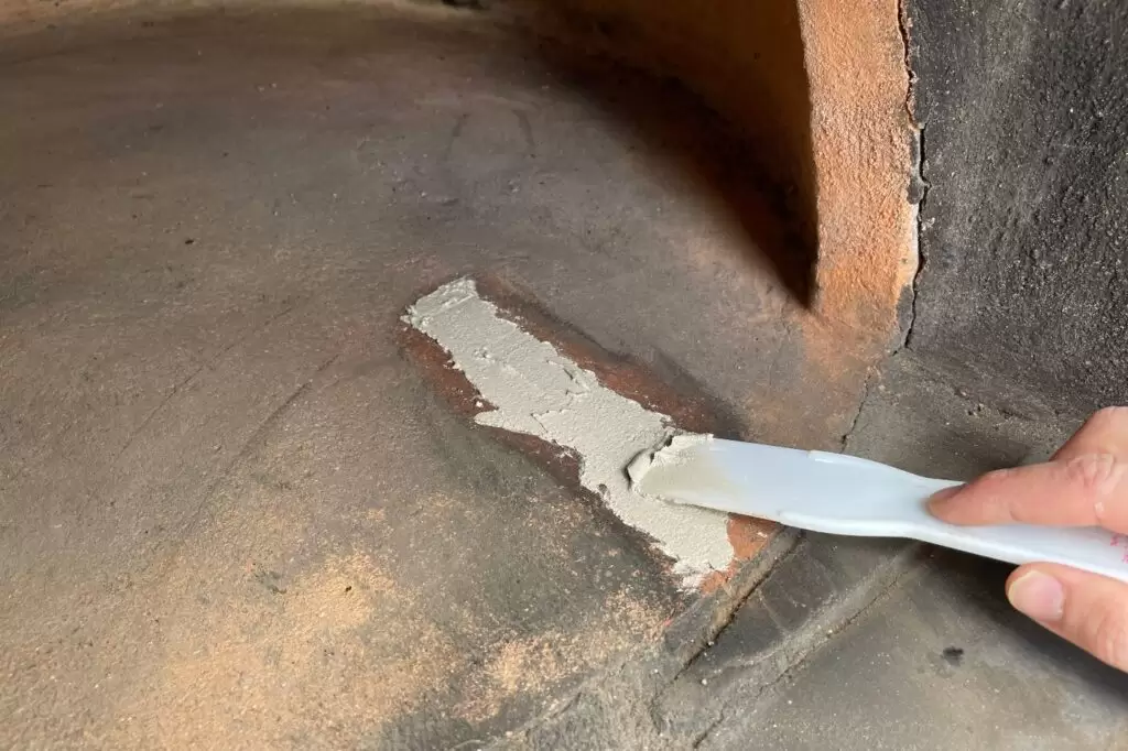 How to repair interior cracks on your clay pizza oven